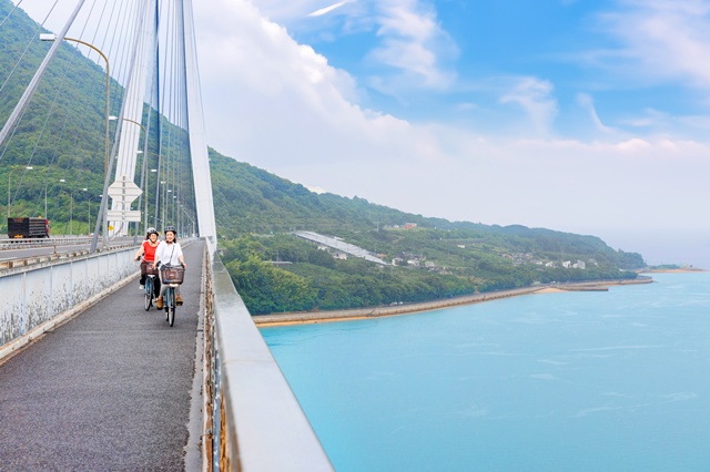 Shimanami Cycling: A scenic bike route through the Seto Inland Sea.